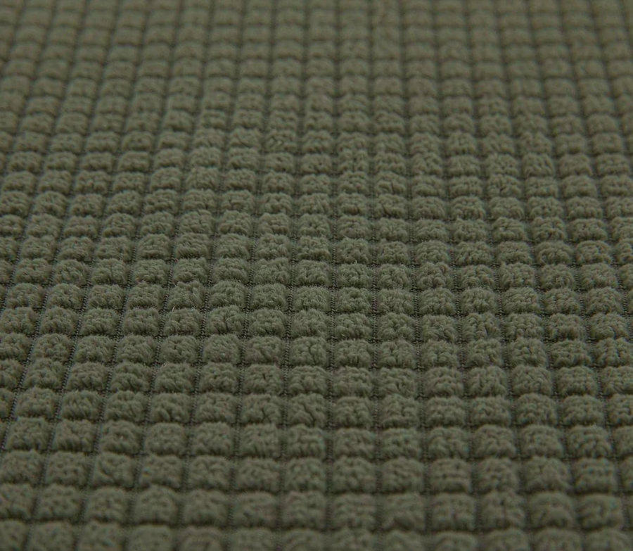 Olive green grid fleece fabric with raised channel pattern