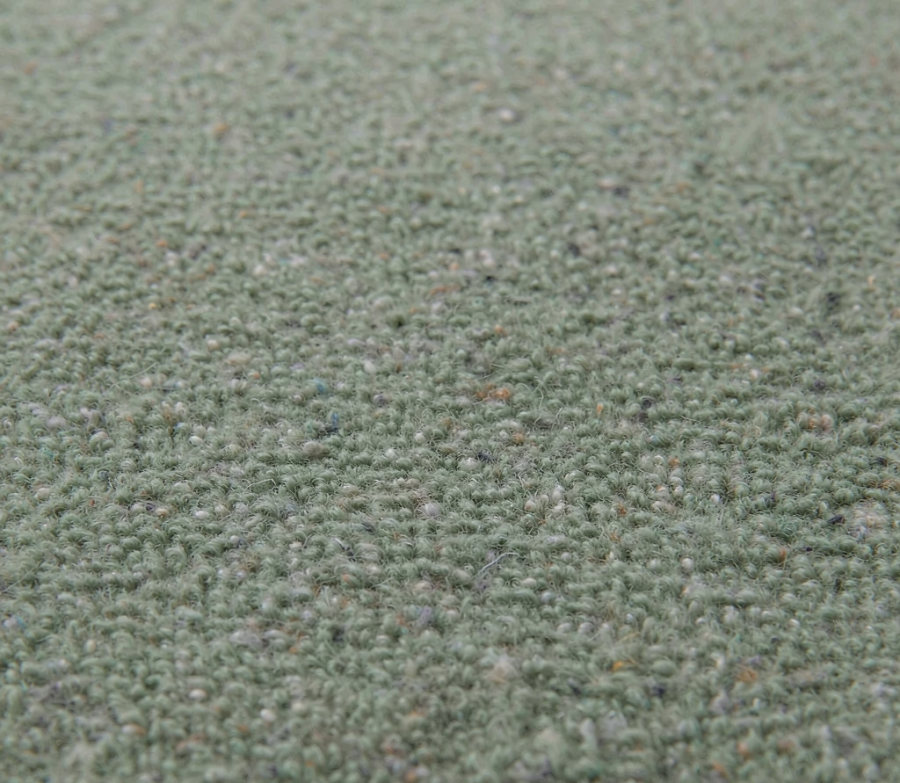 Sage green recycled polyester fleece fabric close-up